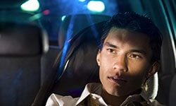 Person driving at night